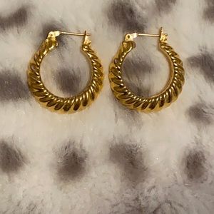 Gold hoop earrings.
